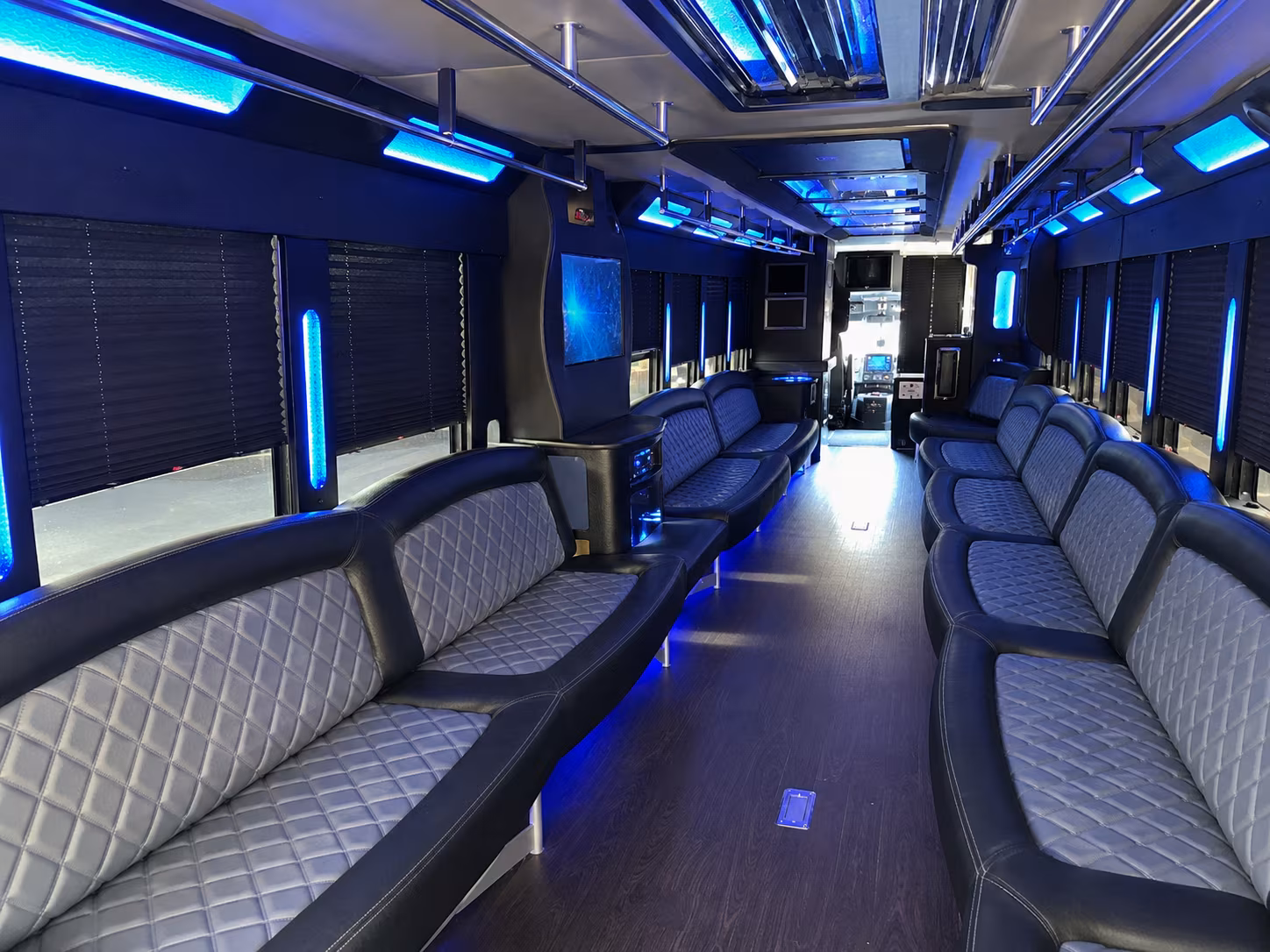 Wedding guests seated inside a party bus serving College Station